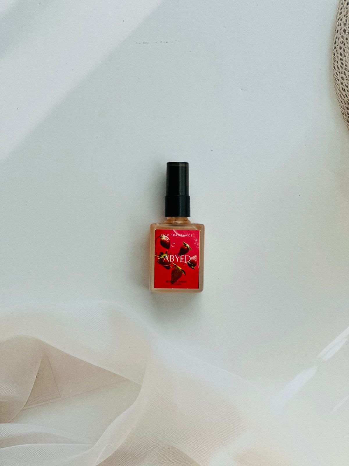 Abyed unisex perfume with strawberry, lychee, and rose notes