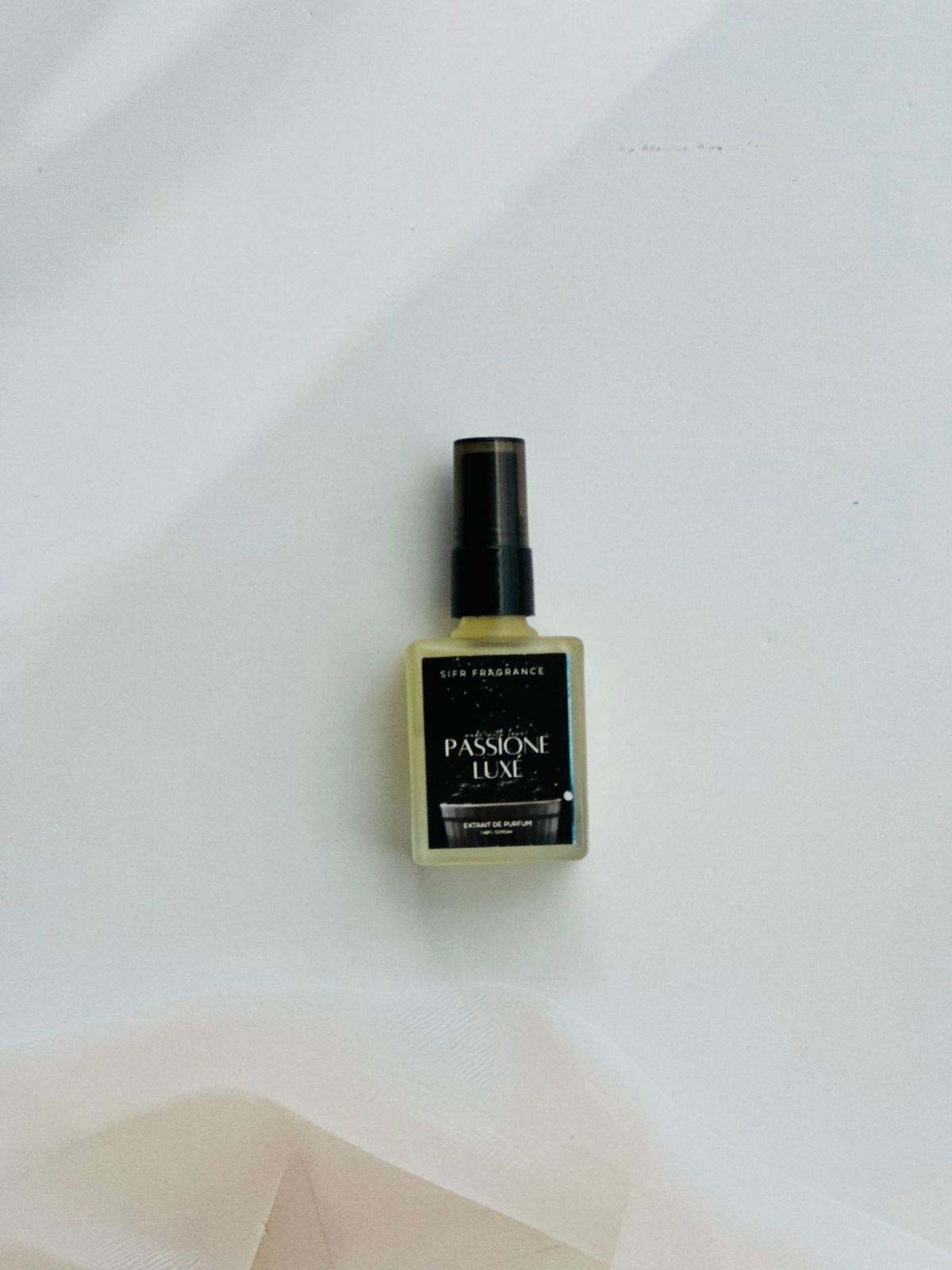 Passion Luxe unisex perfume with pear, rose, and cedar notes