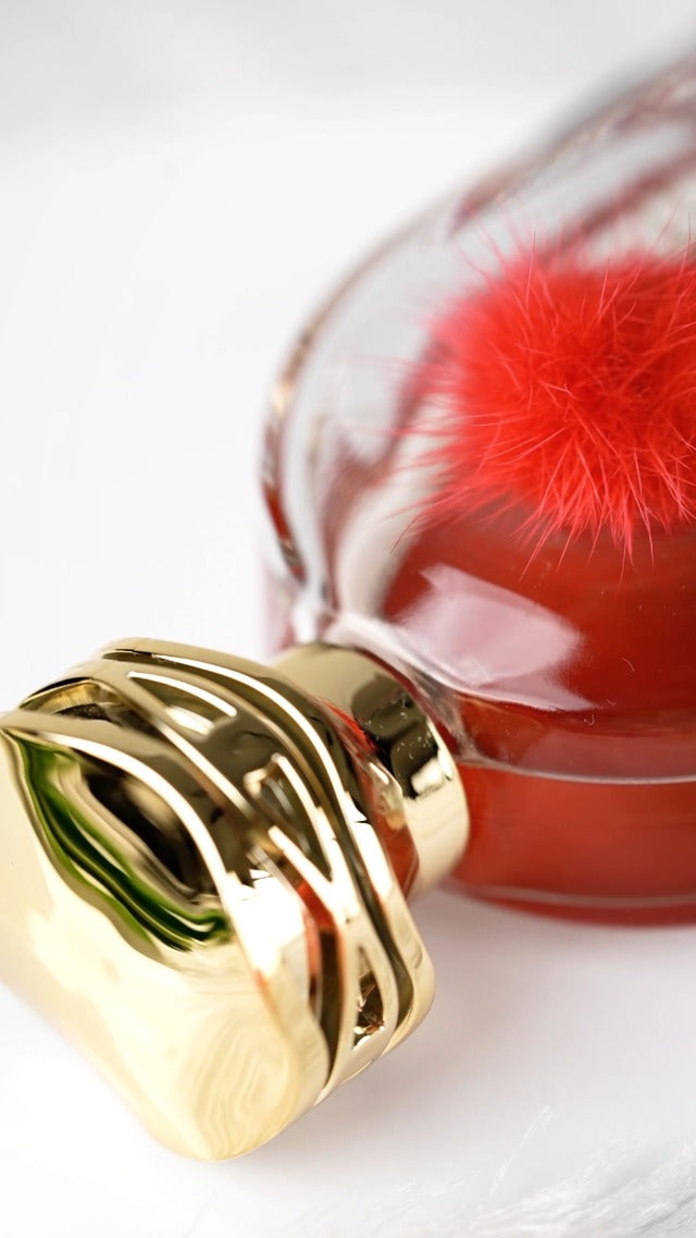 Mamlakat Al Oud Cotton Rouge perfume close up bottle design luxury scent